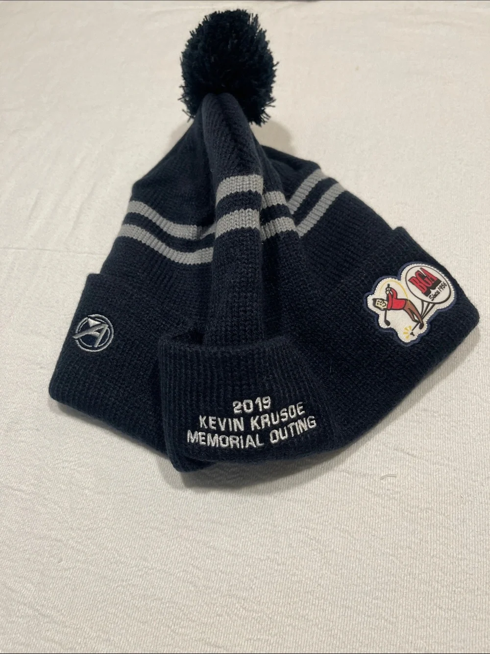 Kevin Krusoe Memorial Outing Pom Beanie Hat - Black with Gray Stripes